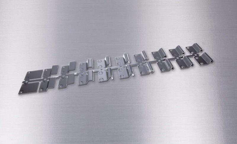 Progressive stamped hinge