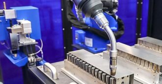 The Yaskawa AR 1440 robotic welder inside the welding cell at Ajax Metal Forming Solutions