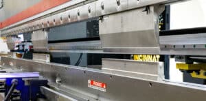 A die on an Ajax 14-foot, 5-axis press brake A die on an Ajax 14-foot, 5-axis press brake